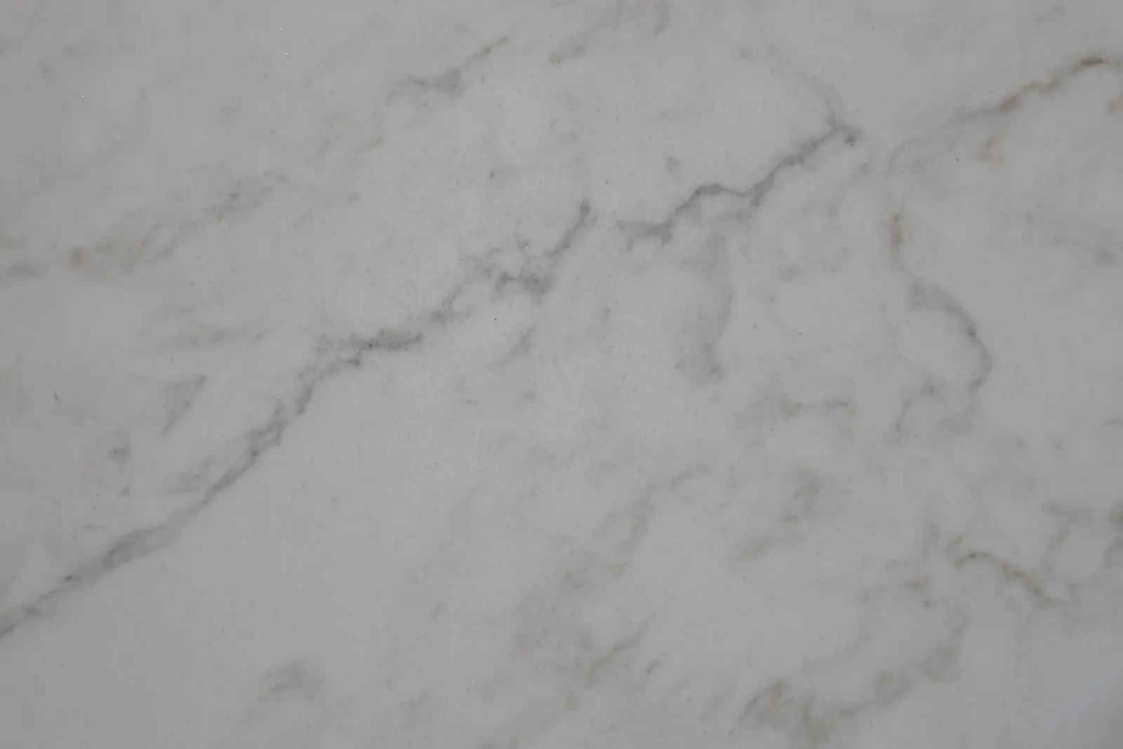 Close-up of Carrara Nella quartz surface and veining